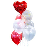 Valentine's Day bouquet of red, white, and gold confetti balloons with heart-shaped red balloon