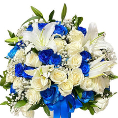 Elegant bouquet of white lilies, blue and white roses with green leaves, fresh flower delivery Kuala Lumpur