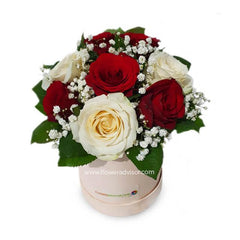 Elegant bouquet of red and white roses with baby's breath in a round FlowerAdvisor Malaysia box