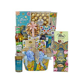 Flower gift hamper with cookies, Ferrero Rocher chocolates, drinks, and floral decorations from FlowerAdvisor Malaysia