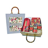 Elegant special gifts hamper with floral bag, red cylindrical tin, and assorted festive jars