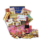 Assorted festive hamper with chocolate, cookies, sweets, gift basket, and sparkling drink