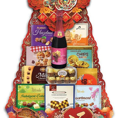 Chinese New Year gift hamper with cookies, chocolates, and sparkling juice in festive packaging