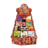 Chinese New Year festive hamper with assorted snacks, chocolates, cookies and a sparkling drink.