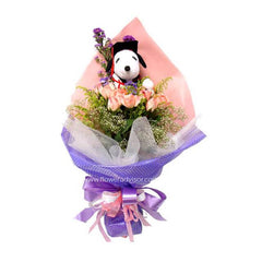 Bouquet of pink roses and purple flowers wrapped in pink and purple paper with Snoopy plush toy, flower delivery Malaysia