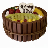 KitKat fruit cake topped with fresh assorted fruits