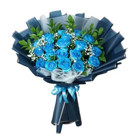 Bouquet of fresh blue roses with green leaves and white baby's breath wrapped in navy blue and white paper, tied with blue ribbon