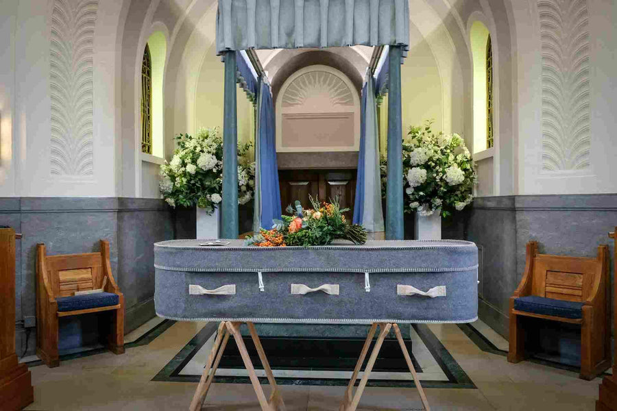 White funeral flowers arranged as a respectful sympathy tribute