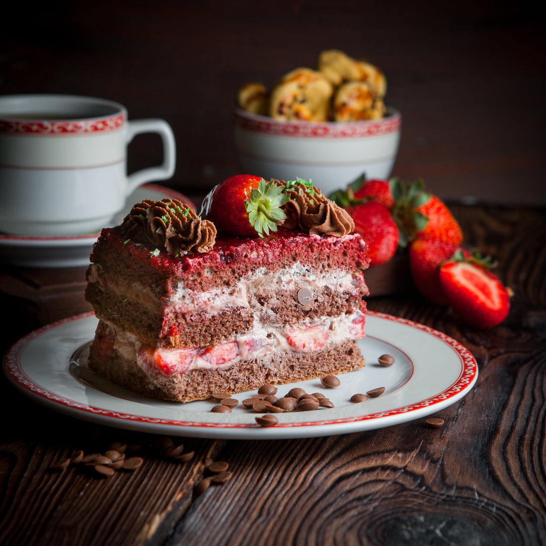 Cake slice and tea representing cake choices for different celebrations