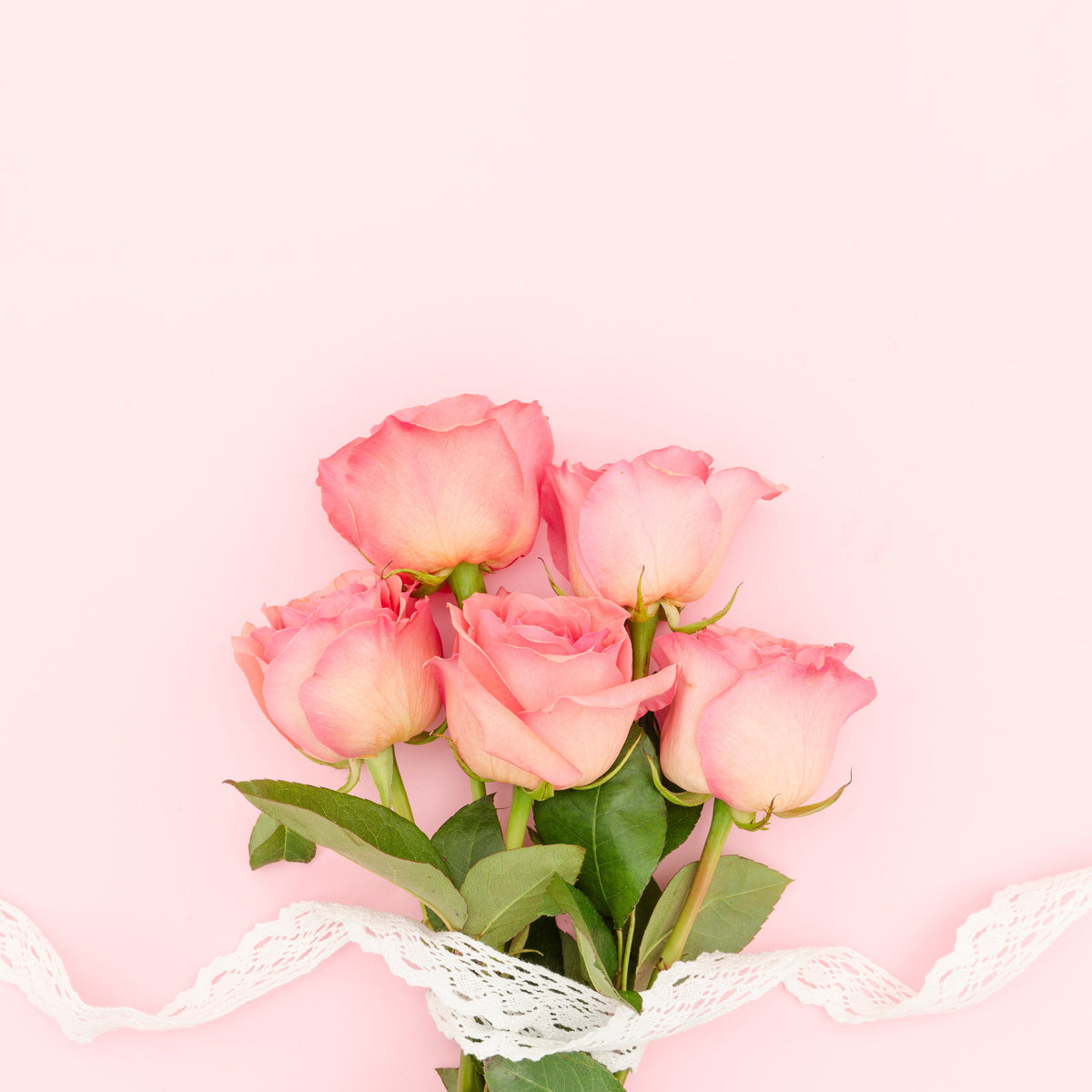 Pink roses arranged for a guide to pink rose meaning and bouquet ideas