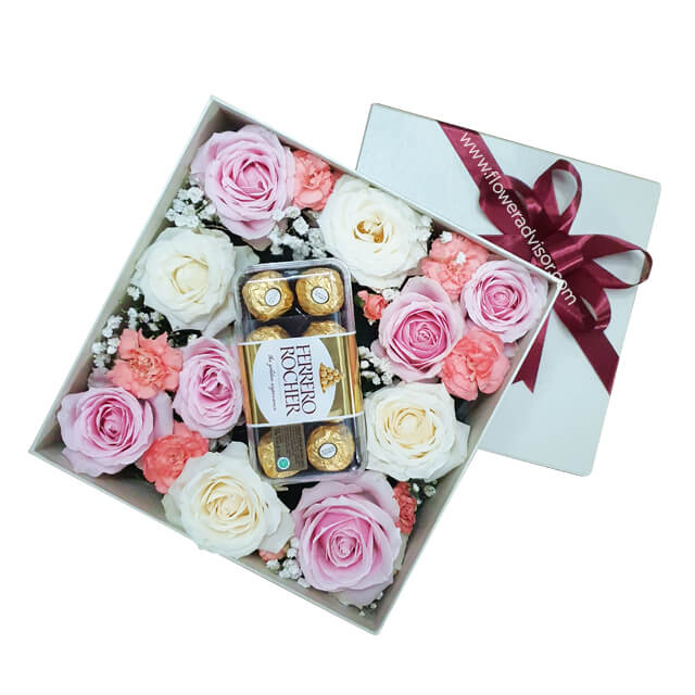 Queen Of Hearts bouquet with pink and white roses and chocolates