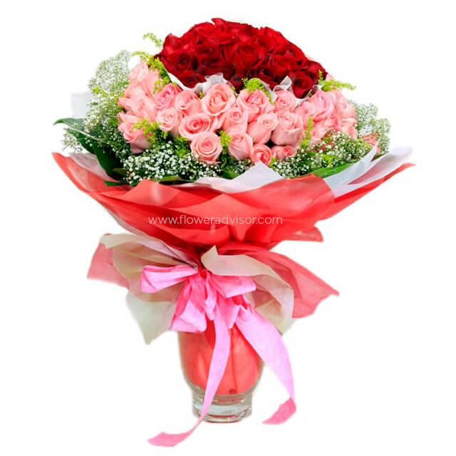 Peachy Keen - 99 mixed red and pink roses hand bouquet