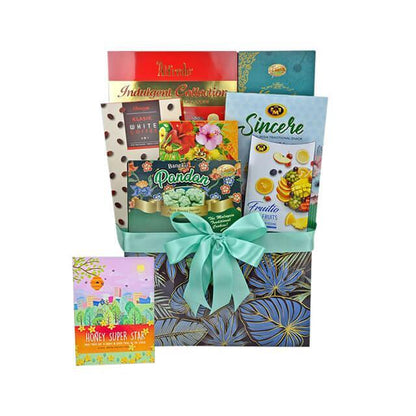 Luxury gift hamper with assorted traditional snacks and sweets in decorative box with teal ribbon