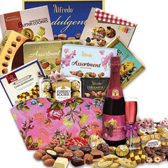 Gift hamper with assorted chocolates, cookies, Ferrero Rocher, and sparkling red grape juice