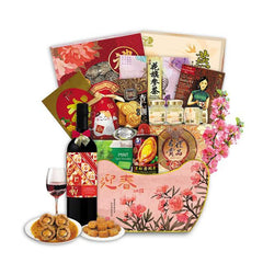 Chinese New Year gift hamper with wine, festive snacks, tea, abalone, cookies, and flowers
