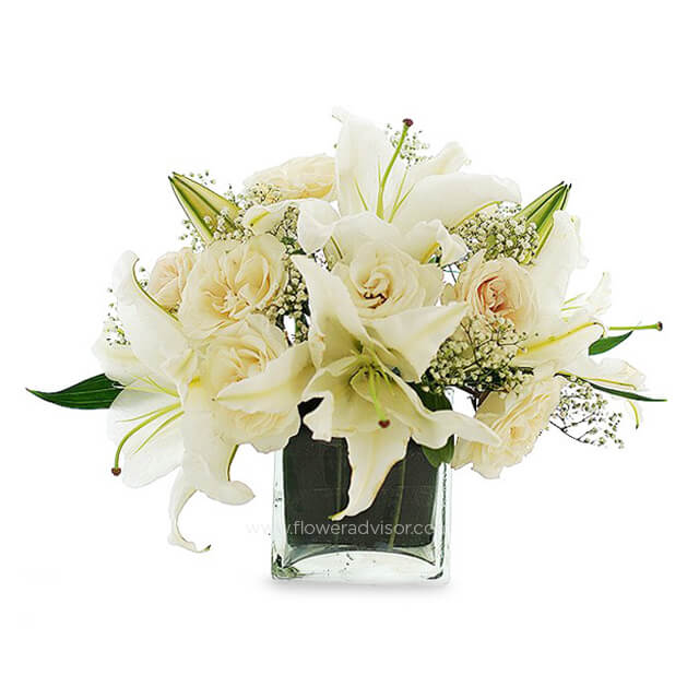 Crystal Glamour - 8 white lilies and 10 white roses in a glass vase